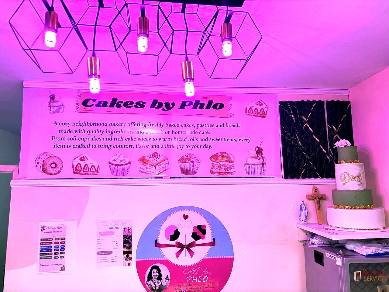 Cakes by Phlo bakery interior with tiered cake display